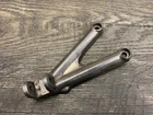 Triumph 2006-20 Daytona 675 Triple Oem Front Left Footrest Footpeg Bracket * Used. Price: $49.99.