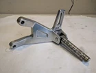 1987-1988 Yamaha FZR700/750 Left Foot Peg Mounting Bracket 2KT-2741L-00 (YA6) Used. Price: $60.00.