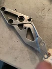 43511-17E00 Suzuki Right Footrest Bracket 1993 Used. Price: $21.00.
