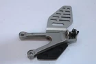06-11 Yamaha Yzf R6 Left Peg Bracket Silver 2C0-27442-00-00 Used. Price: $25.00.
