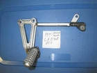 Kawasaki EX250 Ninja Left Passenger Foot Peg Assembly Used. Price: $29.99.