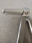 New Yamaha Left Rear Footrest Assy (part# 5JJ-27430-00-00) Fits 2002-2003 R1. Price: $149.99.