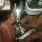 Harley-davidson Footpeg Bracket Remanufactured. Price: $60.00.