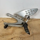 04-06 Yamaha YZFR1 Left Rearset Foot Peg Rest Bracket W/ Shift Lever Silver Used. Price: $34.99.
