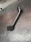 Triumph Scrambler Rear Brake Pedal T2021515 Used. Price: $82.00.