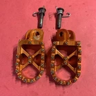 Warp 9 Oversized Mx Foot Pegs Orange Used. Price: $44.99.