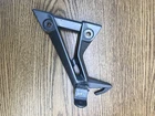 Kawasaki Ninja EX300 2013-2017, Step Holder Rear Left Part # 35063-1271 Used. Price: $25.99.