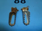 Kawasaki 1983-1984 KX60/KX80 Foot Pegs #34028-1169, #34028-1170 Used. Price: $13.99.