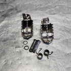 2003 Kawasaki KX65 Footpegs 34028-1529-CE 34028-1530-CE Used. Price: $30.00.