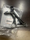 New Factory Oem 2013-2015 Kawasaki Ninja EX300 Lh Step Holder Stay 35063-0841. Price: $99.95.
