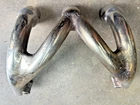 Triumph Trident T150 70-7597 Exhaust Header Pipe Used. Price: $42.00.