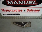1982 Suzuki GS1100E Right Side Footpeg Bracket 43811-49500 Used. Price: $29.95.
