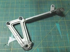 1993 Kawasaki EX250 Ninja 250R Oem Left Side Passenger Foot Peg Bracket Used. Price: $9.95.