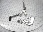 2009 06-09 Aprilia Tuono 1000 Oem Left Front Foot Peg Shifter Pedal Bracket Used. Price: $92.95.