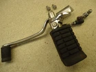 85-86 Honda Shadow VT1100 Left Front Foot Peg Rest W/ Linkage Gear Shifter Lever Used. Price: $109.90.