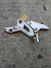 2023 Cfmoto Front Left Foot Peg Mount Bracket Rest Used. Price: $199.91.