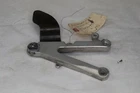 Oem Yamaha Right Rear Passenger Footpeg Holder 1999 4XV-27440-00-00 Used. Price: $40.00.