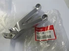 Honda CBR900RR,CBR954RR 2002-03 Oem Left Footrest Holder 50760-MCJ-750 New. Price: $23.50.