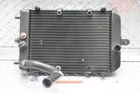 2004 Kawasaki Vulcan VN1500L Nomad Fi Cooling Radiator Assembly 39060-1165 Used. Price: $149.99.