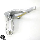 2022 Triumph Tiger 900 Front Left Rearset Foot Peg Bracket Used. Price: $95.00.