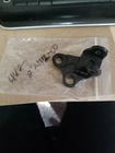 1982 Yamaha YZ125J 5X4 - Footrest Peg Left Bracket Mount New. Price: $25.00.