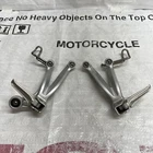 Suzuki ADC6 35F Oem Footrest Pegs Brackets Rearsets Used. Price: $42.50.