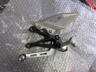 Triumph 765RS Street Triple New Original Lh Footrest / Gear Lever Assembly. Price: $134.55.
