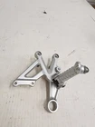 Aprilia RSV4 Right Passenger Foot Peg Bracket 858734 Used. Price: $74.97.