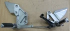 2004 Suzuki SV650 Left & Right Foot Peg Bracket 43521-16G21/43511-16G21 S3 Used. Price: $250.00.