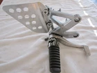 1994-98 Kawasaki ZX900 Rhs Brake Pedal Bracket 35011-1700GD 43001-1338 Used. Price: $92.75.