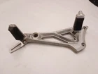Suzuki GS550ED Left Muffler Bracket With Footrests Fits 1983-1986 Used. Price: $43.20.