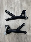 Triumph Tiger 660 Sport Set Of Pillion Hangers T2082679 T2082680 T2088202/3 Used. Price: $67.78.