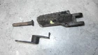 1979 Suzuki Left Foot Peg Rest Assembly 43561-40401-019 Used. Price: $20.00.