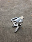 99-04 1999 Triumph Speed Triple Front Left Foot Peg Rest Mounting Bracket Used. Price: $149.95.