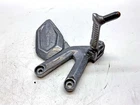 2022 Triumph Trident Front Left Footrest & Hanger - T2086601 Used. Price: $53.70.