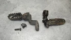 1976 Yamaha Left And Right Foot Peg With Brackets 483-27412-02-00 Used. Price: $50.00.