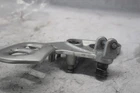 Front Right Footrest Bracket 43510-24F00 2006 Suzuki Hayabusa GSX1300R Used. Price: $30.00.