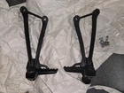 Used Oem Kawasaki Rear L&r Brackets And Footrests 35063-0445-11E &35063-0444-11E. Price: $150.00.