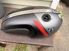 Triumph Thruxton 1200 Oem Fuel Tank Matt Storm Grey First Come Served Used. Price: $700.00.