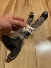 T2081942 Footrest Hanger, Rear, Rh Street Triple New. Price: $100.00.